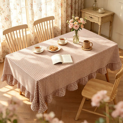 brown plaid farmhouse tablecloth draped over rectangle table