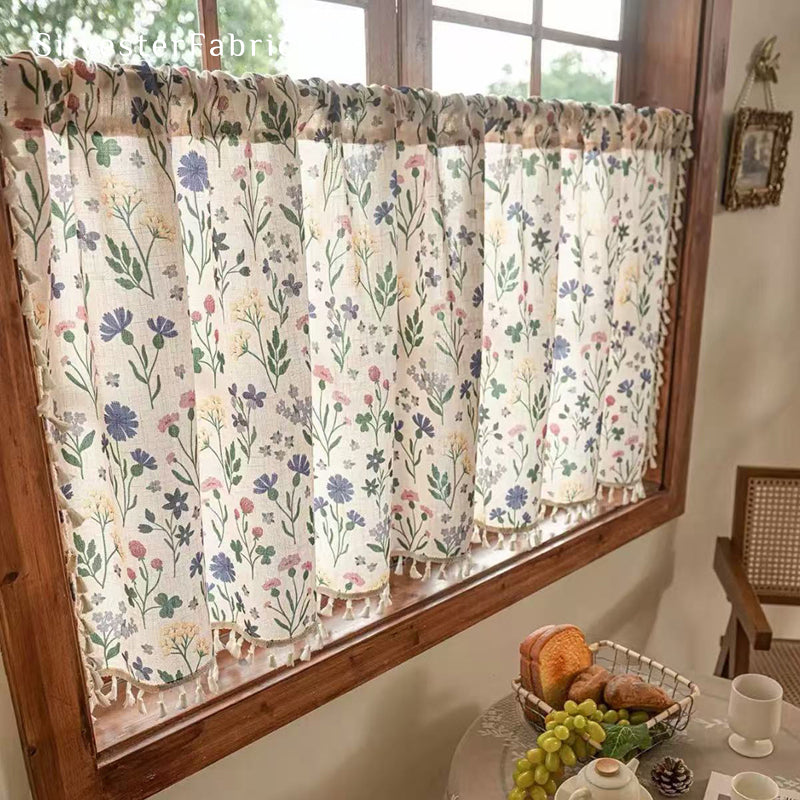 farmhouse floral cafe curtain hanging in window