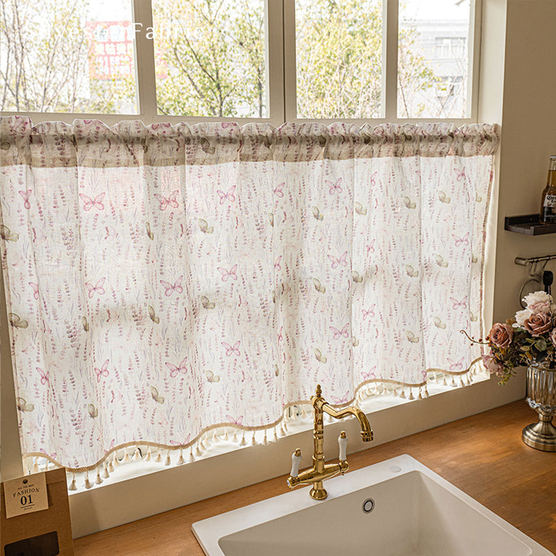 beige farmhouse cafe curtain hanging in window