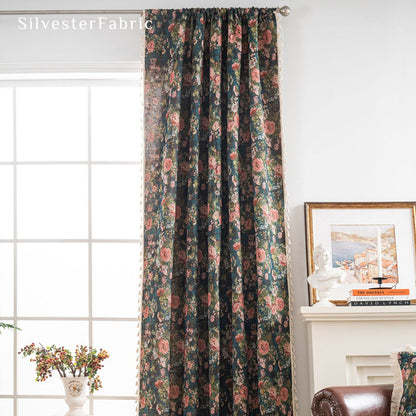 black farmhouse floral curtain hanging in window