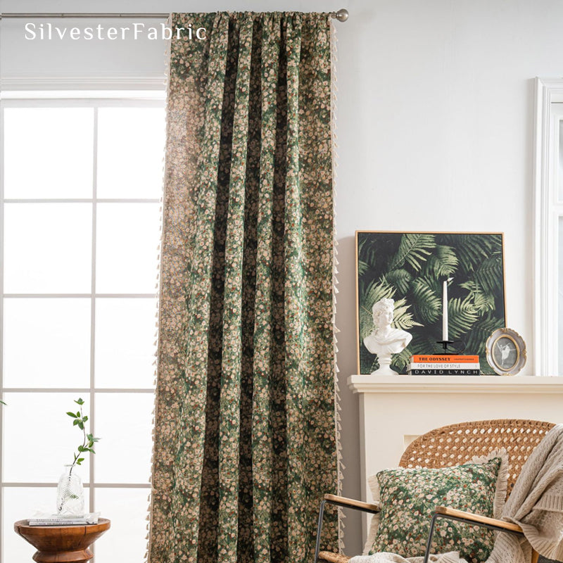 green farmhouse floral curtain hanging in window