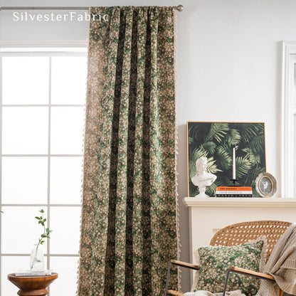 green farmhouse floral curtain hanging in window