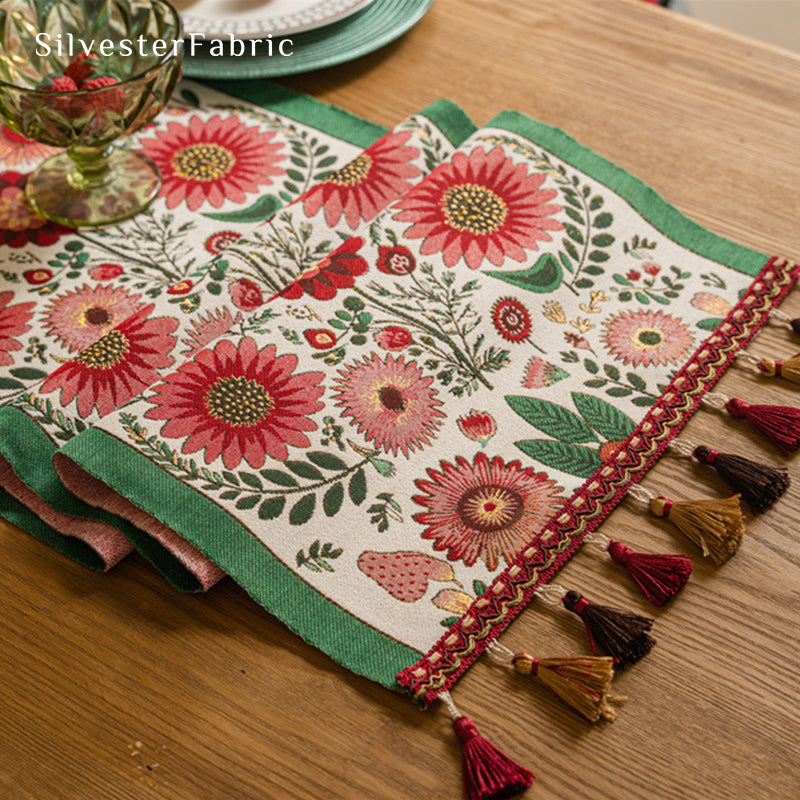 Gorgeous floral table runner in the center of a wooden table