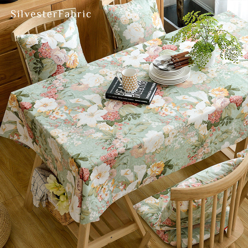 Luxury floral green tablecloth on the dining table