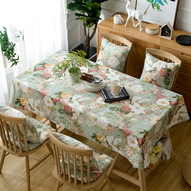 Luxury floral green tablecloth on the dining table