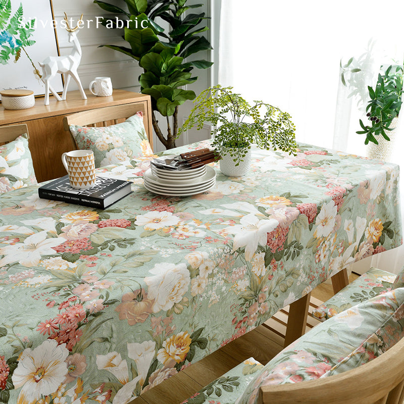 Luxury floral green tablecloth on the dining table