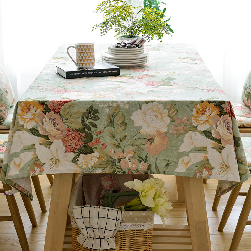 Luxury floral green tablecloth on the dining table