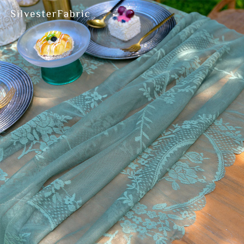 green lace table runner fabric close-up