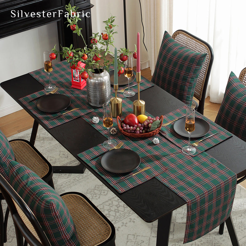 green plaid table runner draped over rectangle table