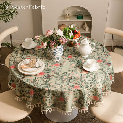 green round  farmhouse  floral tablecloth laid flat on dining table