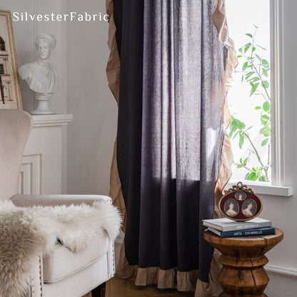 grey french cotton curtain hanging in window