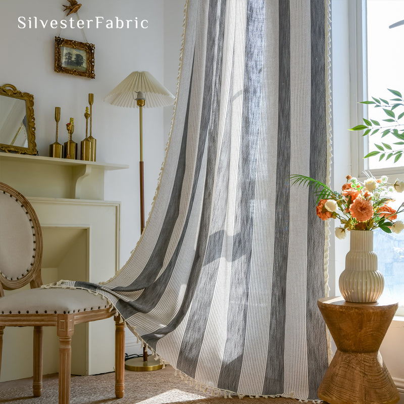 Close‑up of Green striped curtain corner