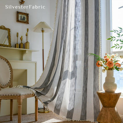 Close‑up of Green striped curtain corner