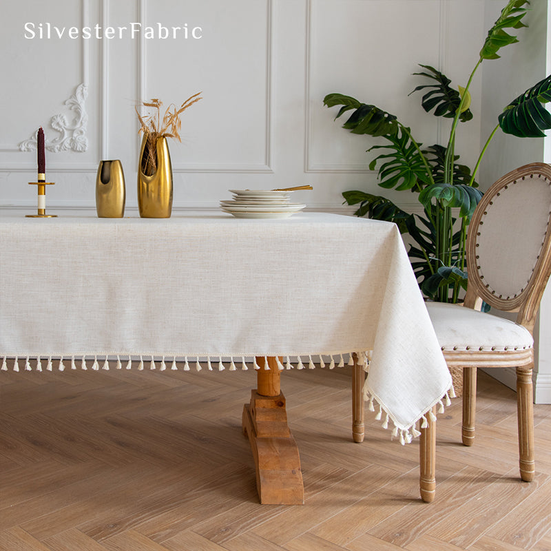 Off White linen tablecloth covers a rectangular table