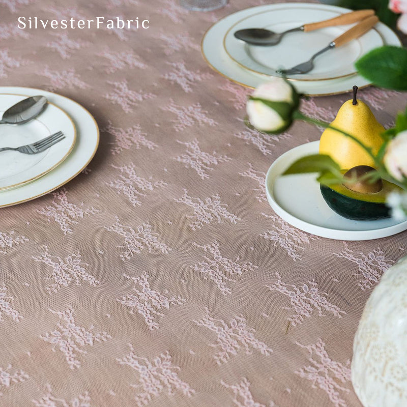 pink lace table runner fabric close-up