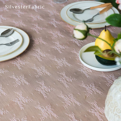 pink lace table runner fabric close-up