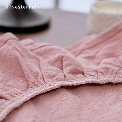 pink farmhouse round placemats edge stitching detail