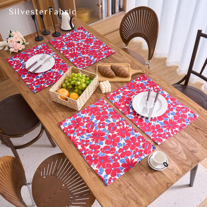 red floral farmhouse placemats set of 4 arranged on rectangle table