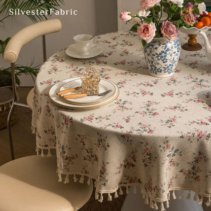 farmhouse floral round tablecloth laid flat on dining table