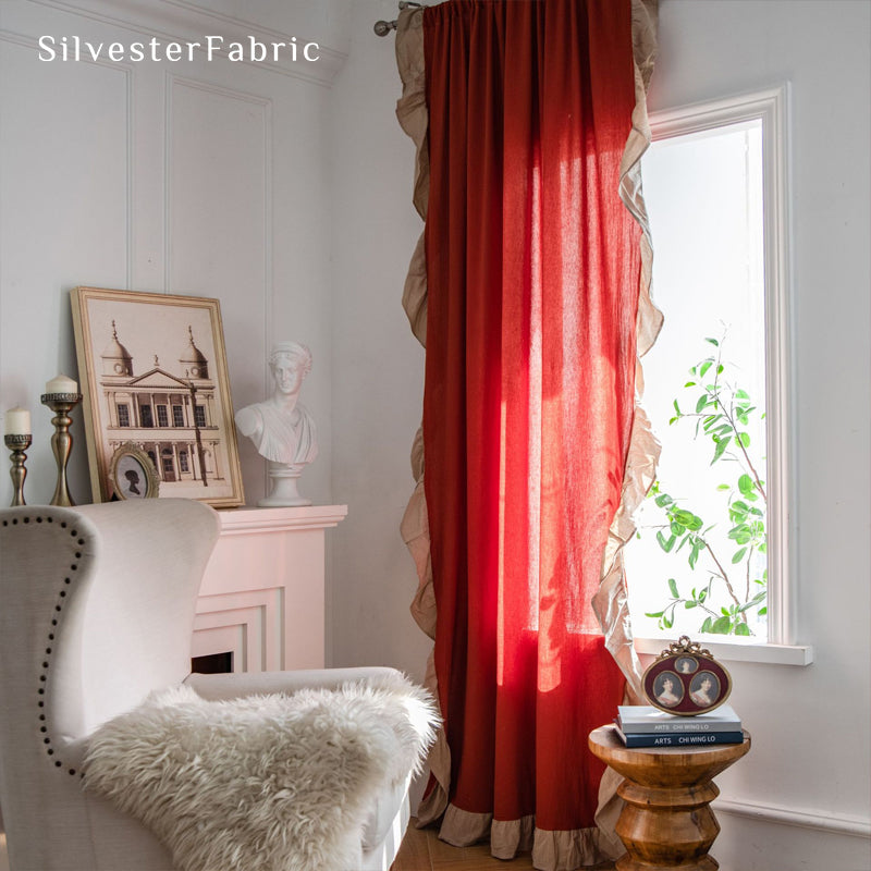 red french cotton curtain hanging in window