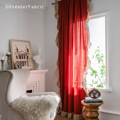 red french cotton curtain hanging in window