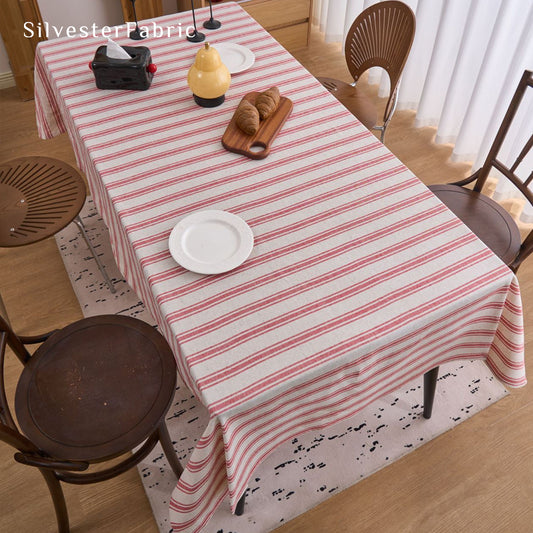 red striped farmhouse tablecloth draped over rectangle table
