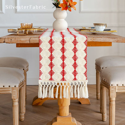 Extra long red table runner on a wooden table