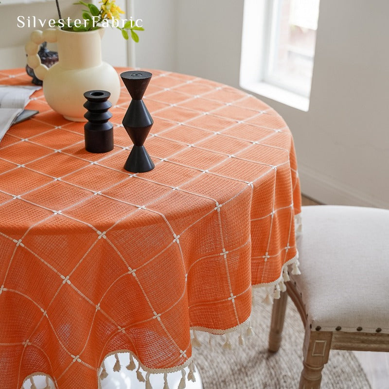 Orange plaid tablecloth on the table