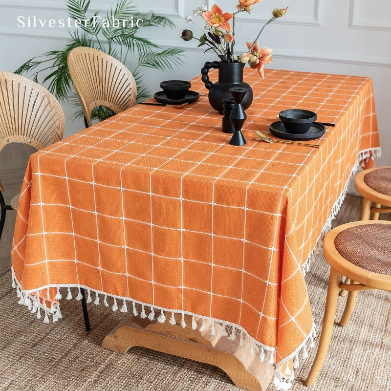 Orange plaid tablecloth on the table