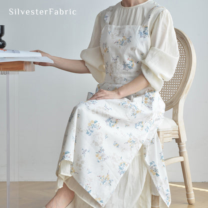 Close‑up of White Floral Bib Apron
