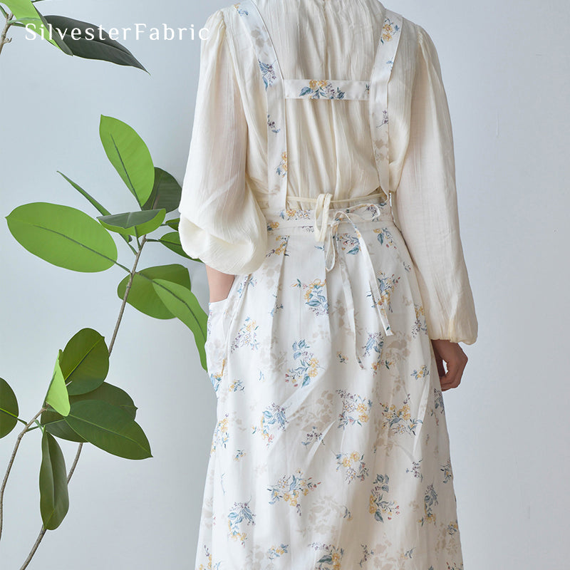 Close‑up of White Bib Apron corner