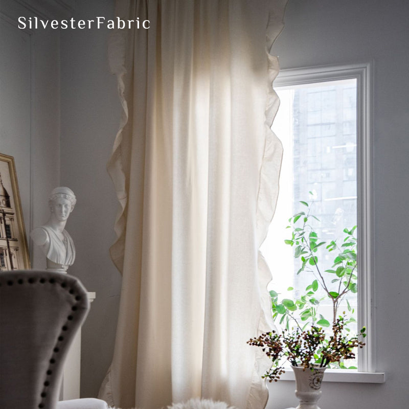 white french cotton curtain hanging in window