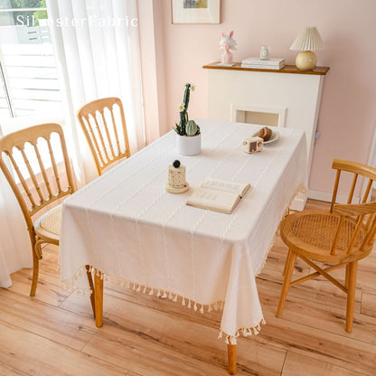 white farmhouse striped tablecloth laid flat on dining table