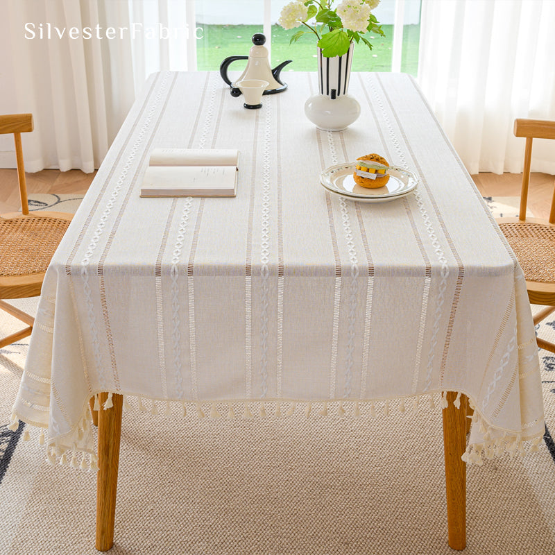 white striped farmhouse rectangle tablecloth draped over table