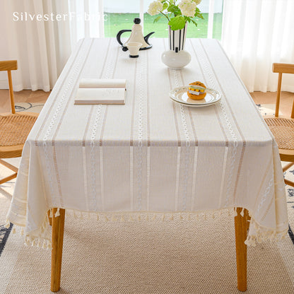 white striped farmhouse rectangle tablecloth draped over table