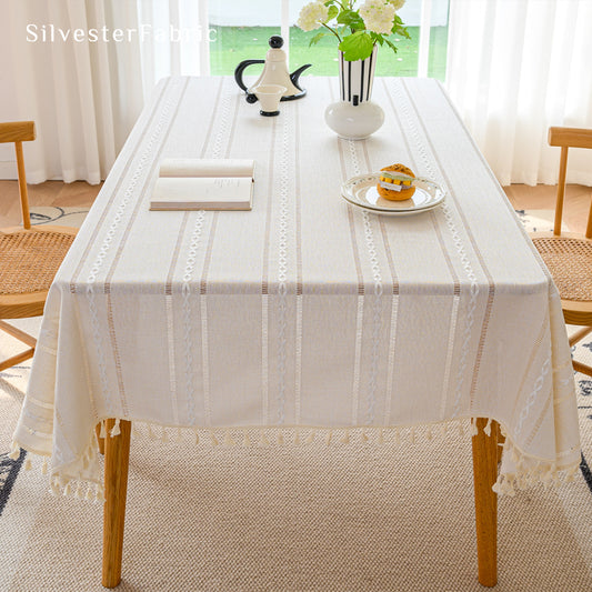 white striped farmhouse rectangle tablecloth draped over table