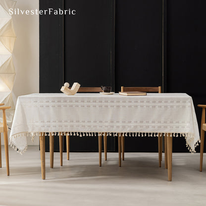 white farmhouse rectangle tablecloth draped over rectangle table